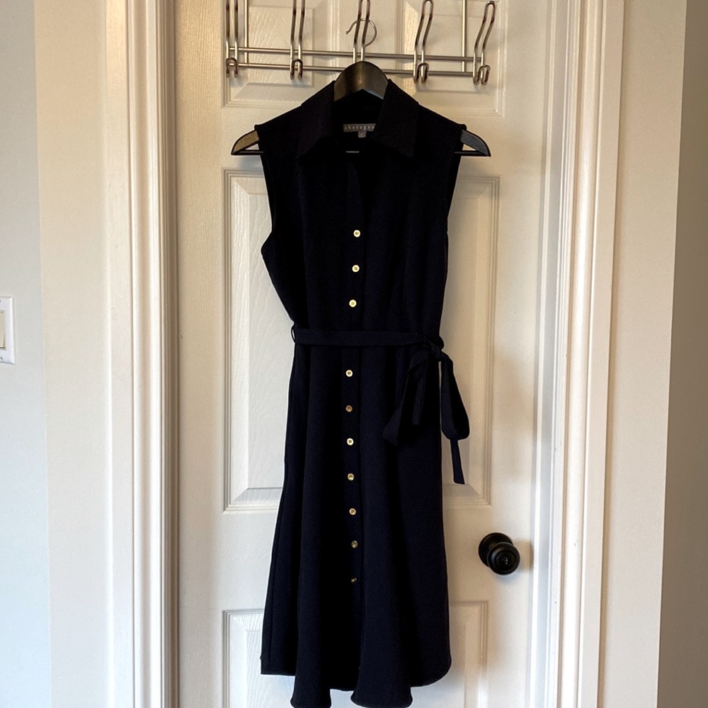 Petite midi-length shirt dress with fuller skirt. Reminds of Charlotte in SATC.